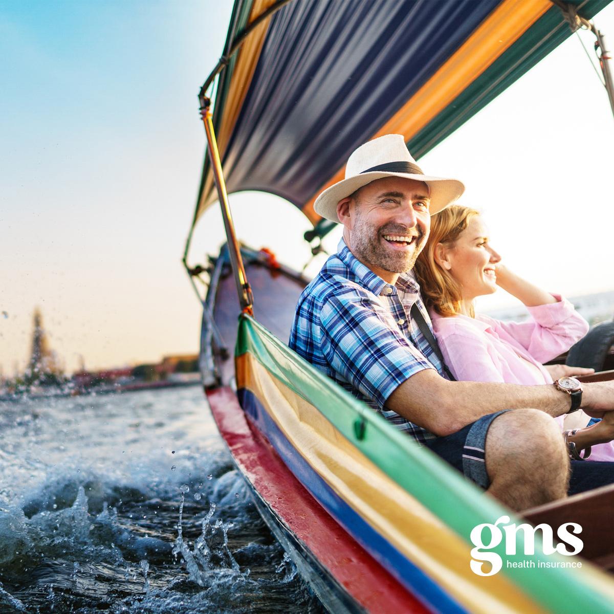 Man and woman on a boat smiling