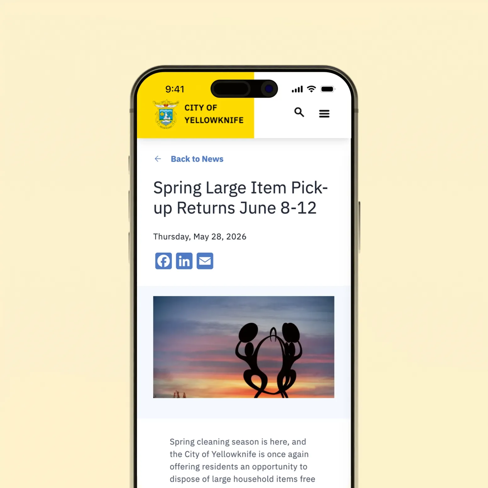 Smartphone mockup showing a City of Yellowknife news article with social sharing options