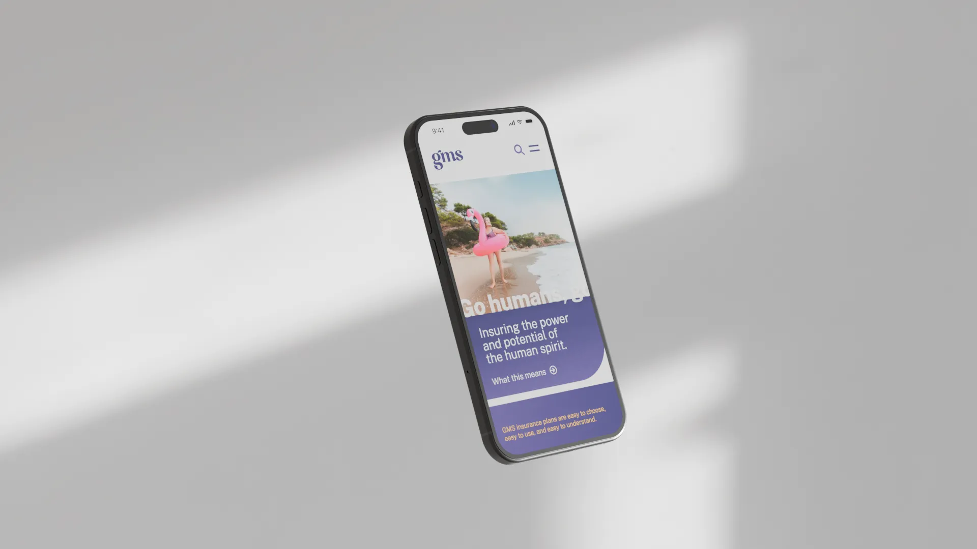 Angled smartphone mockup displaying the GMS mobile website