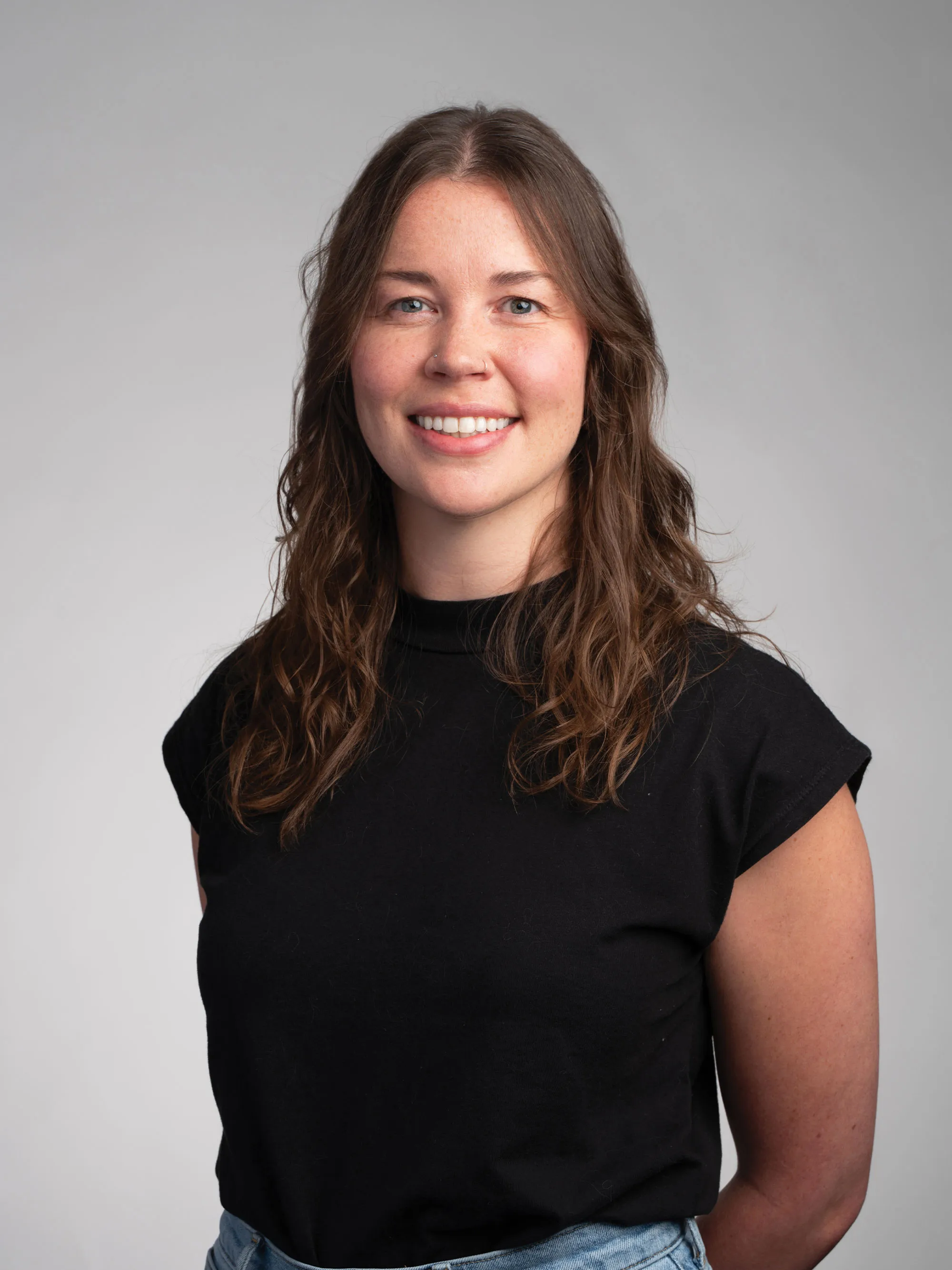 A headshot of Rachel Elson smiling