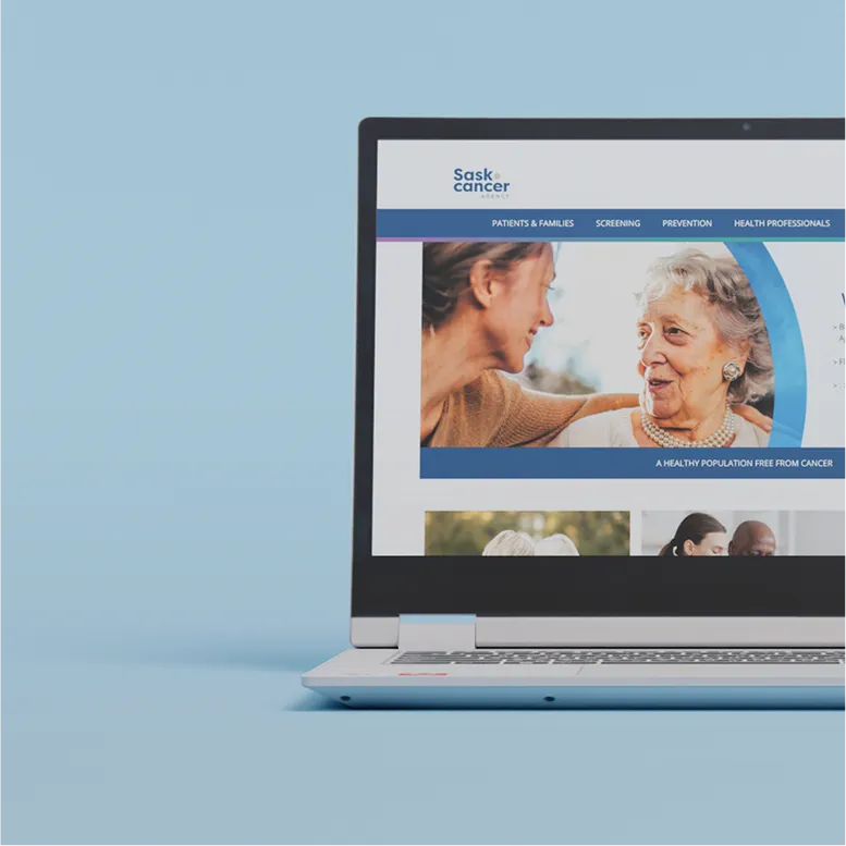 Laptop mockup showing the Sask Cancer Agency website homepage on a light blue background